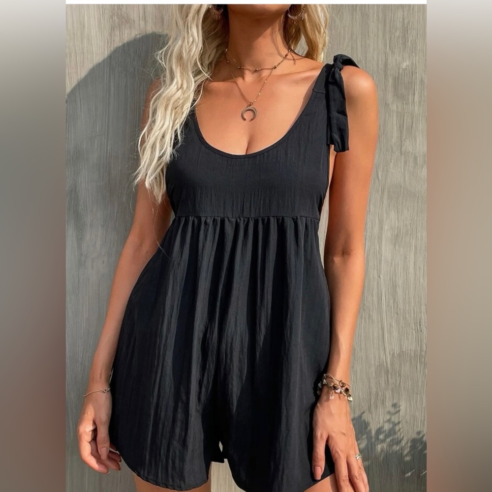 Small black romper with tie straps